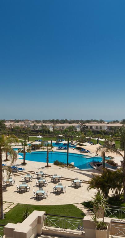 Jaz Little Venice Golf Resort Ain Sukhna Exterior foto View of the pool at the Al Hamra Golf Club